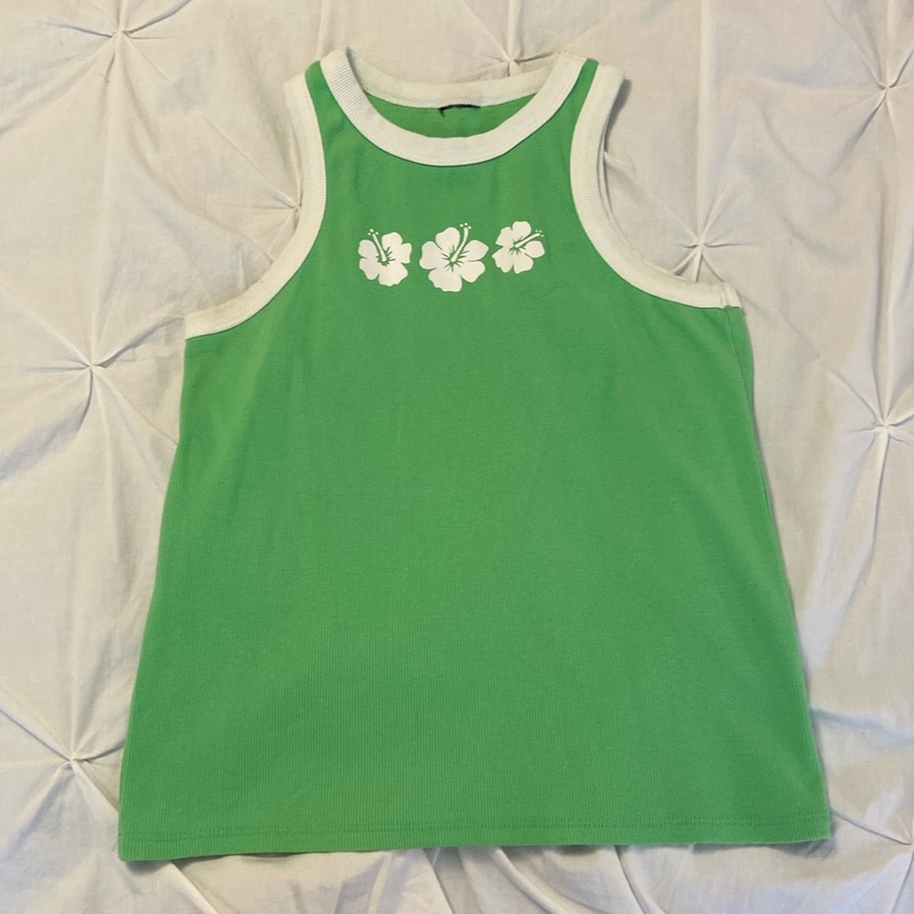 green tank top with white hawaiian flowers